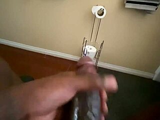 I'm tugging my big black cock in this solo homemade handjob session.