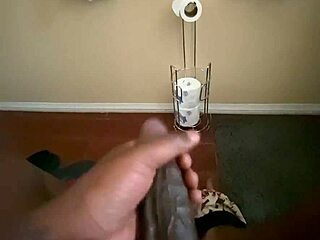 I'm tugging my big black cock in this solo homemade handjob session.