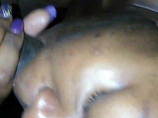 amateur satin sheetz kneels down and starts giving a passionate blowjob to her partner in this short clip