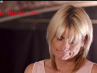 blonde woman dominates the man