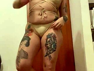 this blonde with tattoo is so erotic in her moves