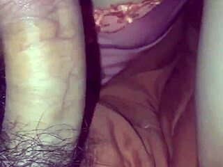 Vietnamese couple explores intimate moments together in their home, sharing passionate encounters with each other as they connect deeply through physical affection and tender touches.