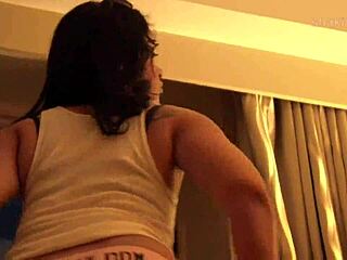 Ashli, a Latina college girl in panties and shorts, shakes her ass high while teasing with striptease and ripped clothes.