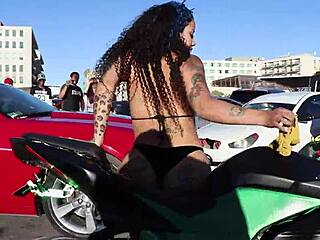 darleen davne at car wash event with tattoos