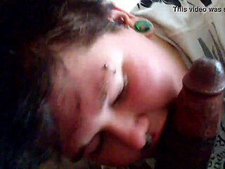 Chubby BBW expertly sucking a fat cock in steamy action.