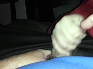 Sarah gives an amazing handjob to his cock in this scene