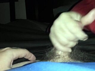 Sarah gives an amazing handjob to his cock in this scene