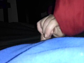 Sarah gives an amazing handjob to his cock in this scene