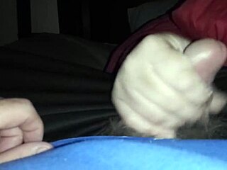 Sarah gives an amazing handjob to his cock in this scene