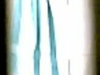 nhi bathes in the shower