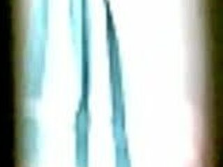 nhi bathes in the shower