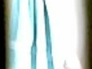 nhi bathes in the shower