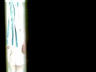 nhi bathes in the shower