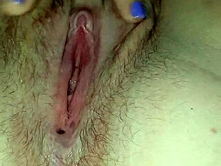 She spreads her pussy solo