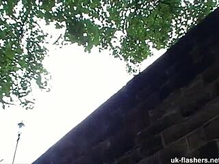 a british woman masturbates outdoors by the lake