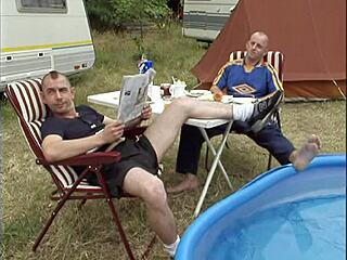 Guys worship feet in outdoor gay orgy