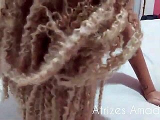 Blonde girl has fun with friend in bed