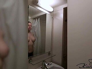 blonde washes and masturbates pussy in shower amateur