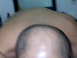 she starts masturbating alone in her room, building up to a big orgasm.