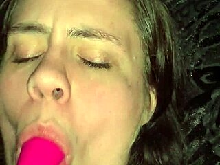 Brunette Abby gives a sloppy kiss to her wet vibrator