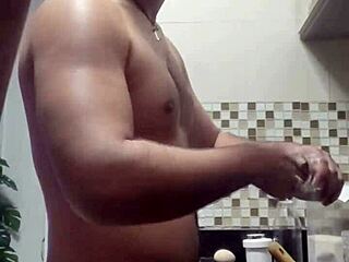 Macho guy bent over in intense doggystyle while washing dishes.