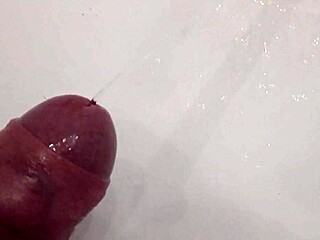 He's Pissing with a Hard Cock, Ready for That Cumshot Blast