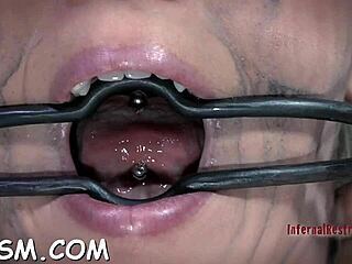 Blonde Slave Bound In Bondage Toys Her Pussy With Fingers