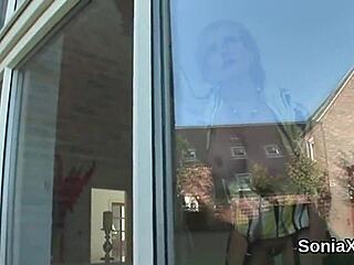 Cheating British milf flaunts massive naturals.