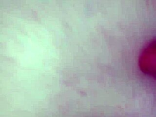 amateur couple having fun together in their bedroom