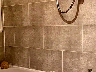 Real amateur wife films herself bathing