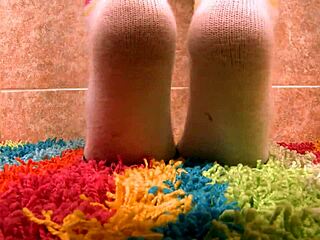 Hey, Keeani is giving a footjob in those slutty socks!