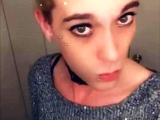 Pretty transsexual in stockings teases her body