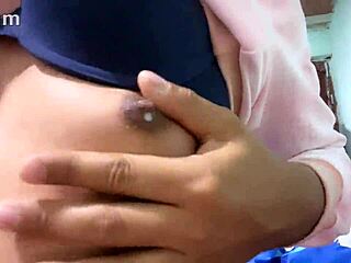 A transvestite is masturbating in a casual setting