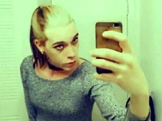 Pretty transsexual in stockings teases her body