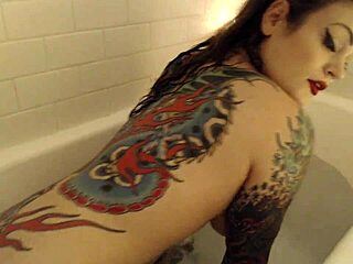 Enjoy a relaxing bath with tattoos on display