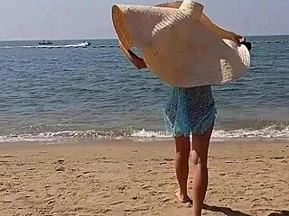 huge hat on public beach as she flashes hairy pussy and small tits up close