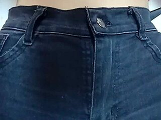 Playing with a belt on her tight pussy