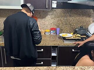Wife pays house debt with her body while husband cooks and listens to her enjoyment.