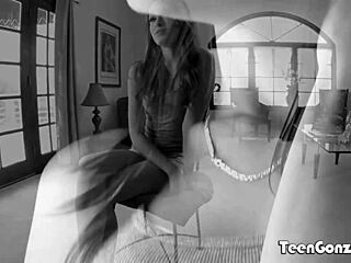 Teengonzo kacy lane relaxing on a leather couch.