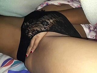 i'm watching sexy latina in lingerie masturbating her big ass, but the video is glitchy or something.