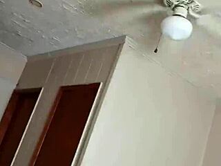 An old milf participates in a spitting ritual.