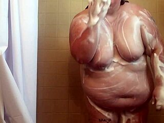 mwkm soaps up her fat ass and pussy nicely.