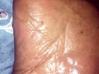 girlfriend gives footjob to boyfriend