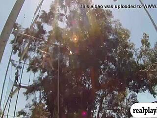 Blonde and brunette babes swing naked in outdoor reality