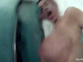 Romi Rain drenches herself in steamy shower solo action