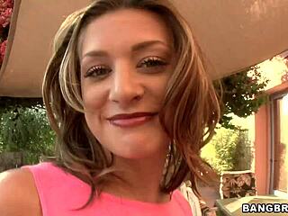 brunette amateur gives footjob casually.