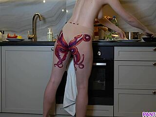 Naked housewife with octopus tattoo on her big ass cooks dinner in the kitchen and ignores you completely.