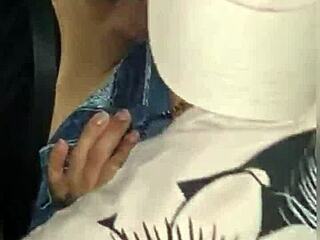 A passionate encounter unfolds on the busy transit route