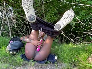 Black amateur masturbates in the woods