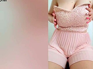 young cutie in pink dress plays with big tits on camera - depravedminx
